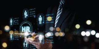 AI Copilots and the Future of Performance Management in HR An HR manager using HR AI Copilots to analyze real-time employee performance data.