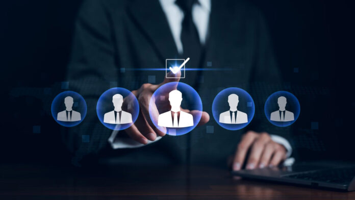 Recruiter using SmartRecruiters AI agents for candidate screening.